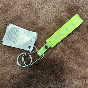 Athleta silicone keychain